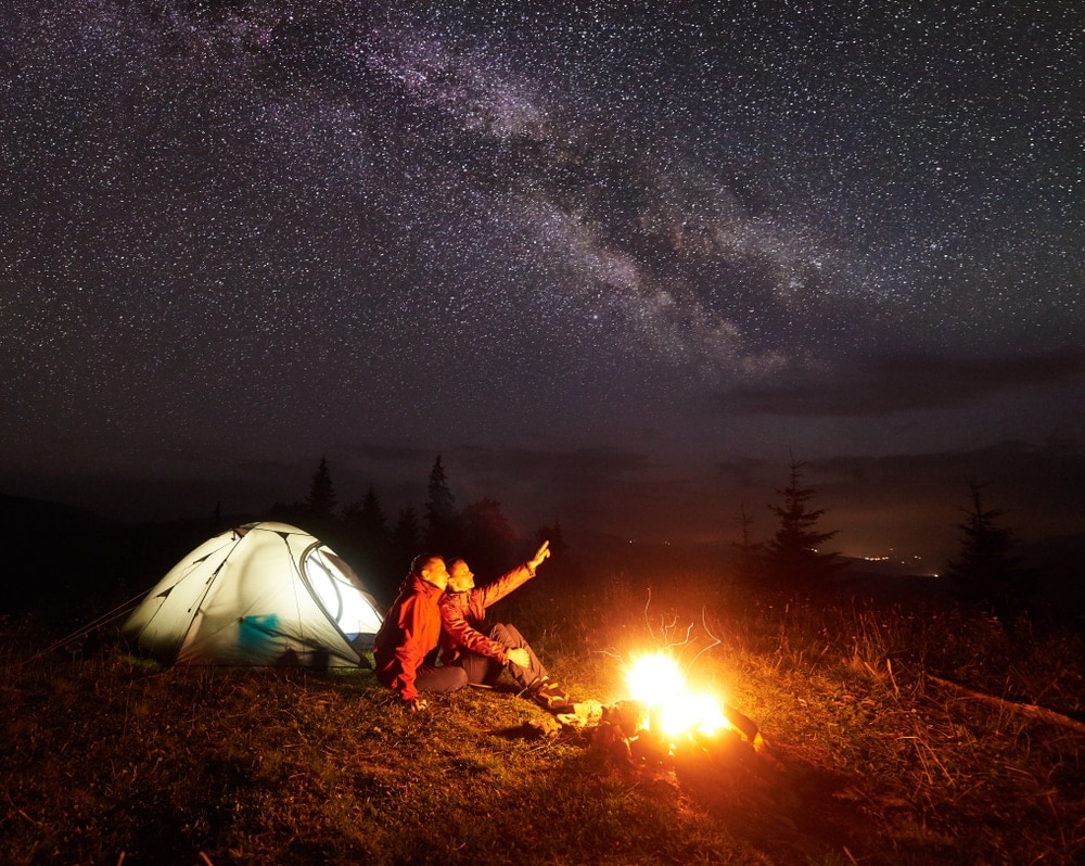 Couple looking at the night sky