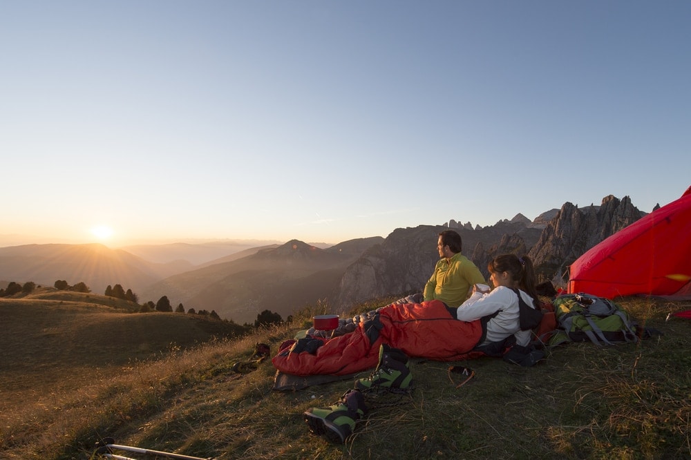 A couple enjoying a sunrise