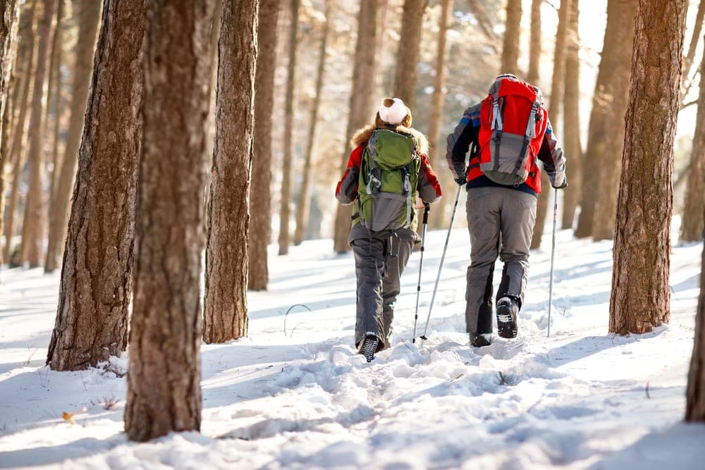 a couple hiking during winter 