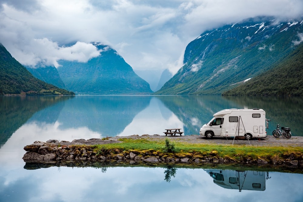 A camper in the middle of a lake