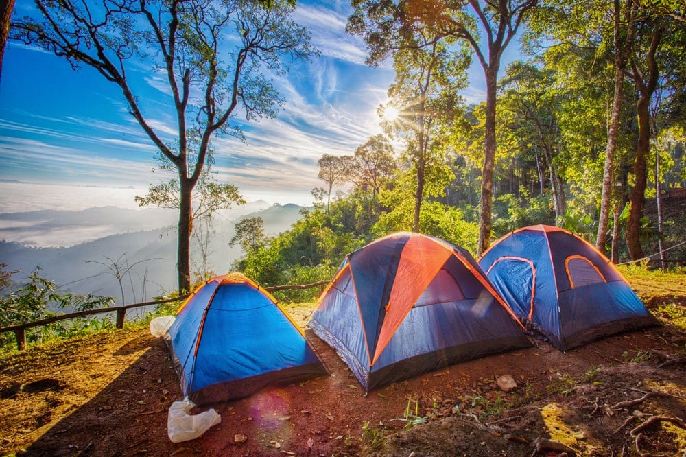 Camping fast pitch tents with amazing sunrise view