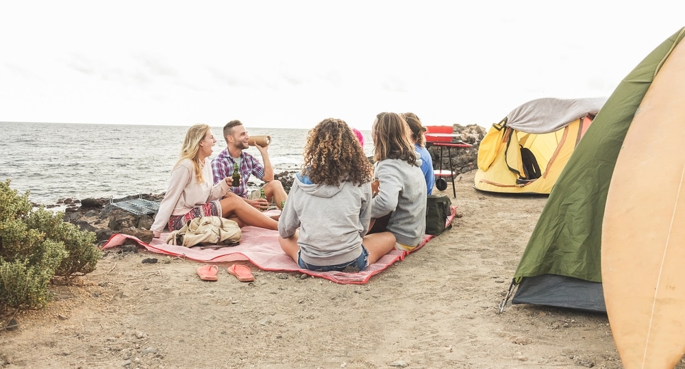 Friends camping in the beach