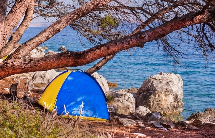 tent placed by the sea
