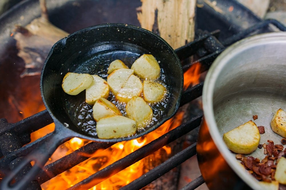 Potatoes cooked over campfire as camping food