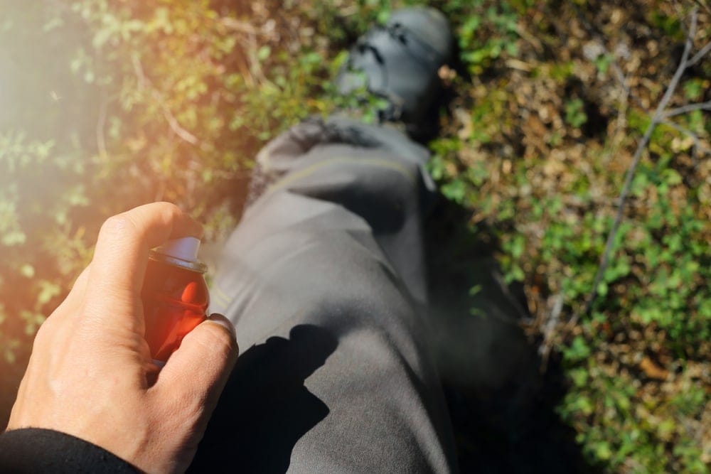 Man holding a spray bottle