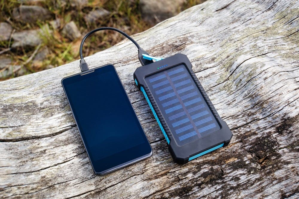 A cellphone and a powerbank for hiking