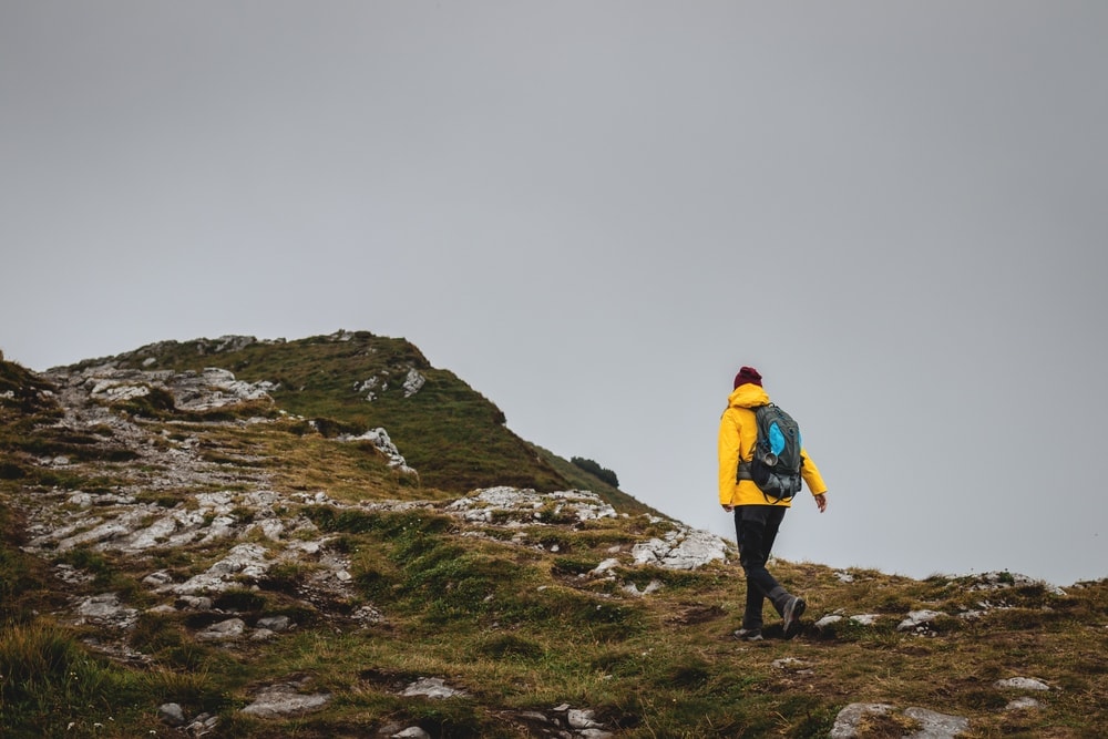 Hiker wearing a jacket hiking