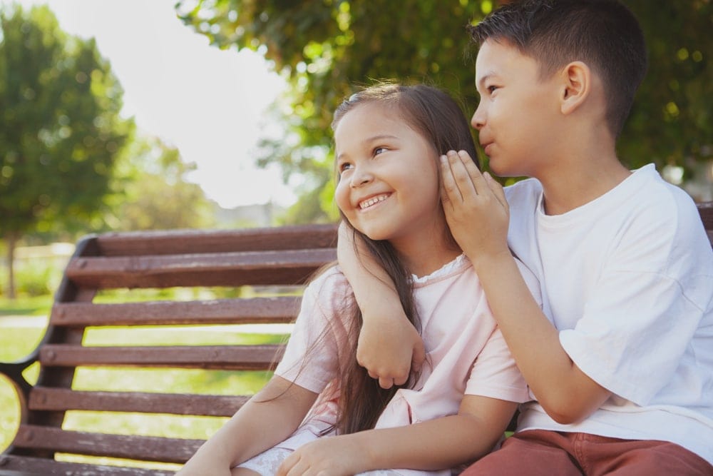 Siblings playing a camping game
