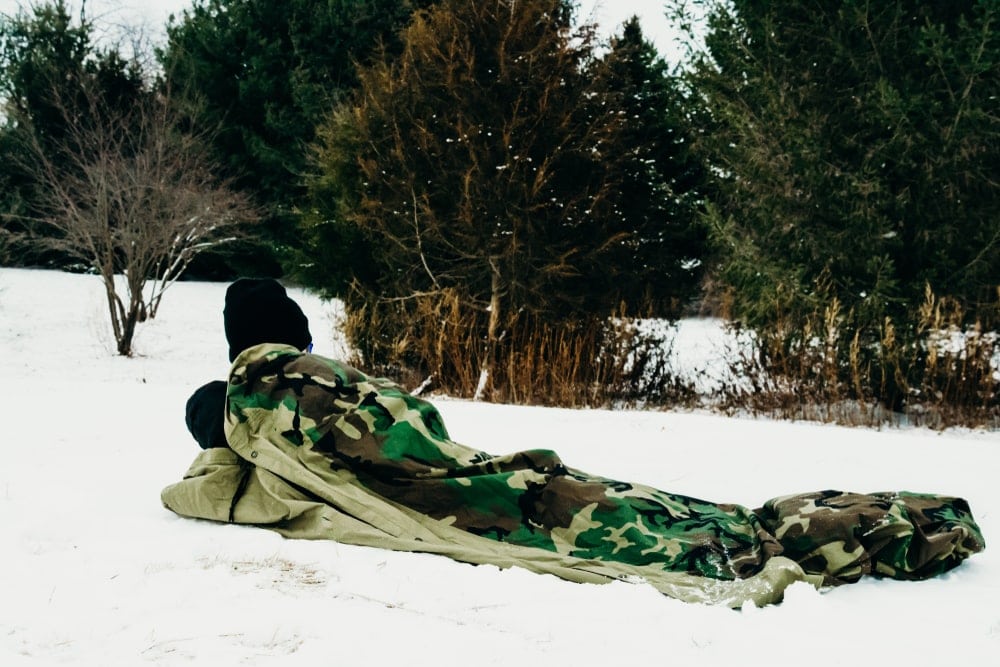 Man inside a sleeping bag