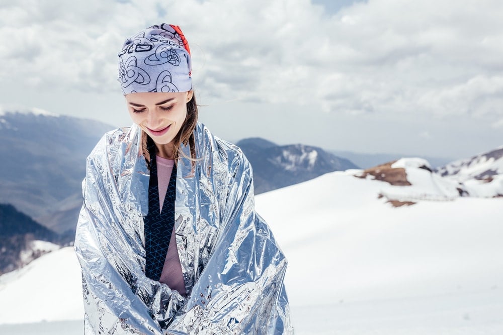 Woman using a thermal blanket