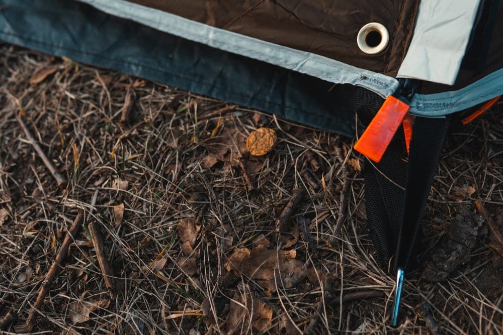 Tent grommer on the ground