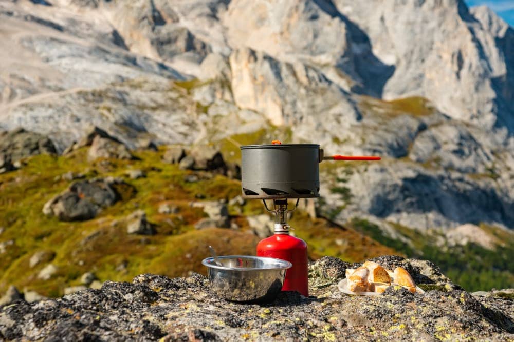 Camp stove and camp food on a mountain