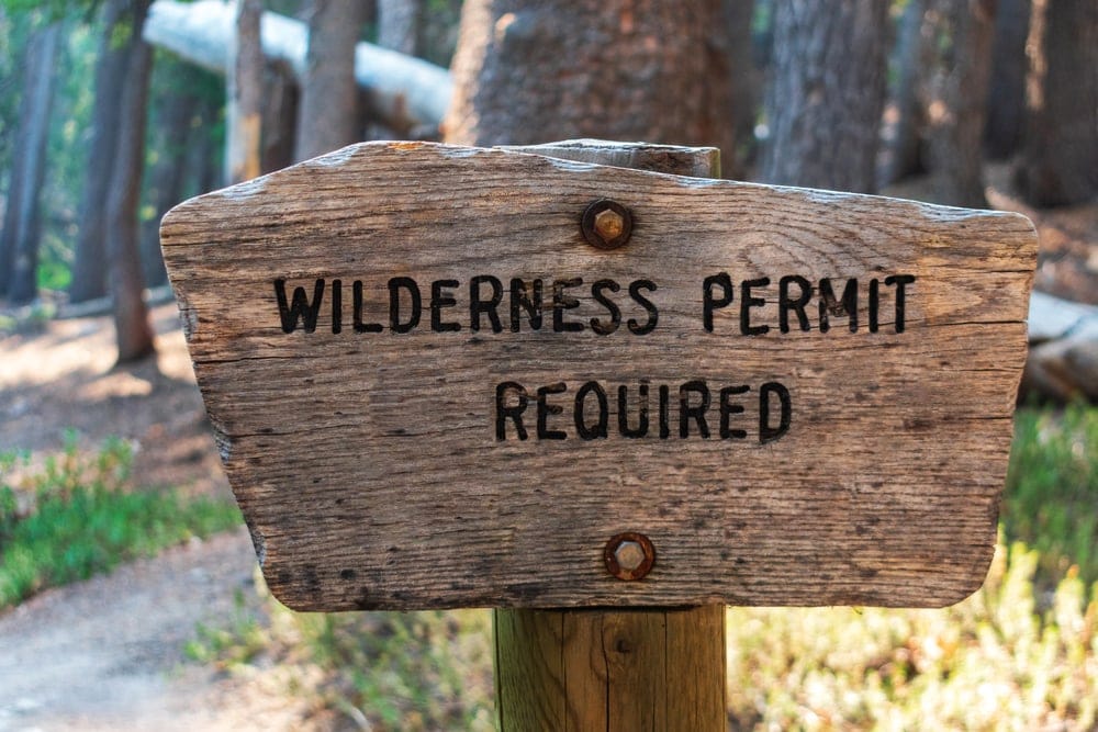 Wilderness backpacking permit required signpost in national parks
