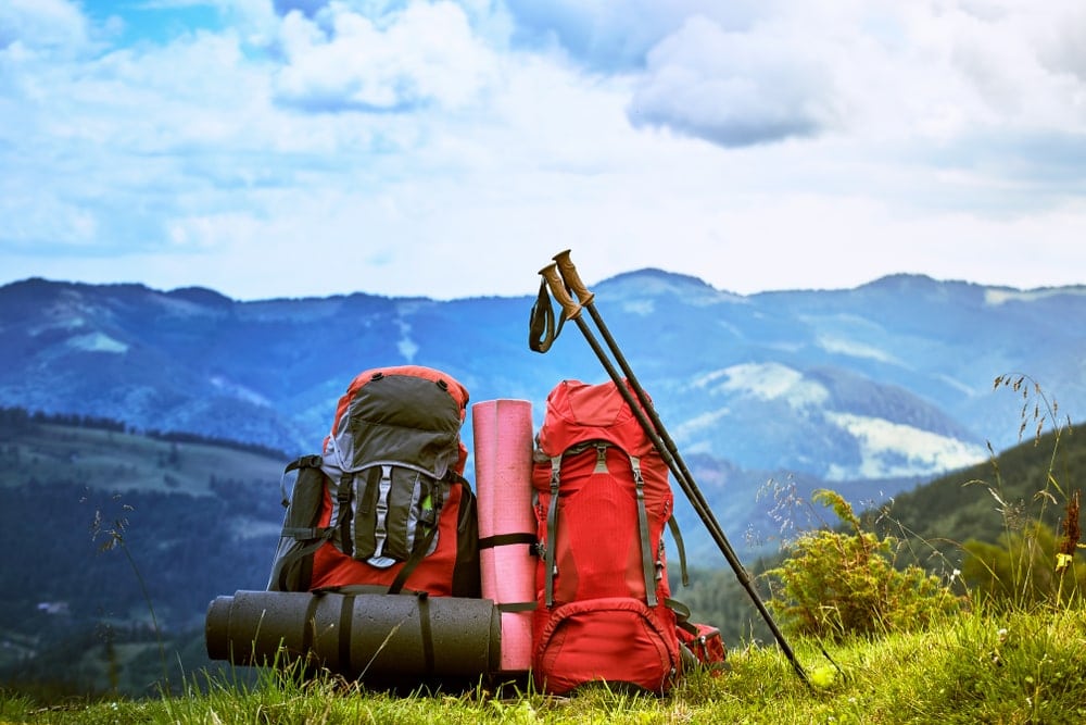 backpacks with gear for wilderness backpacking