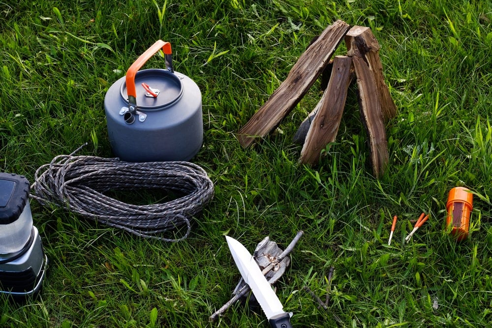 Camping cooking equipment on grass
