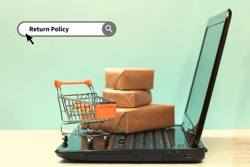 small grocery cart on top of laptop keyboard