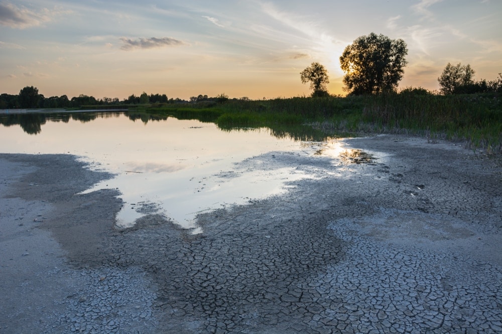 Drying water of a pond