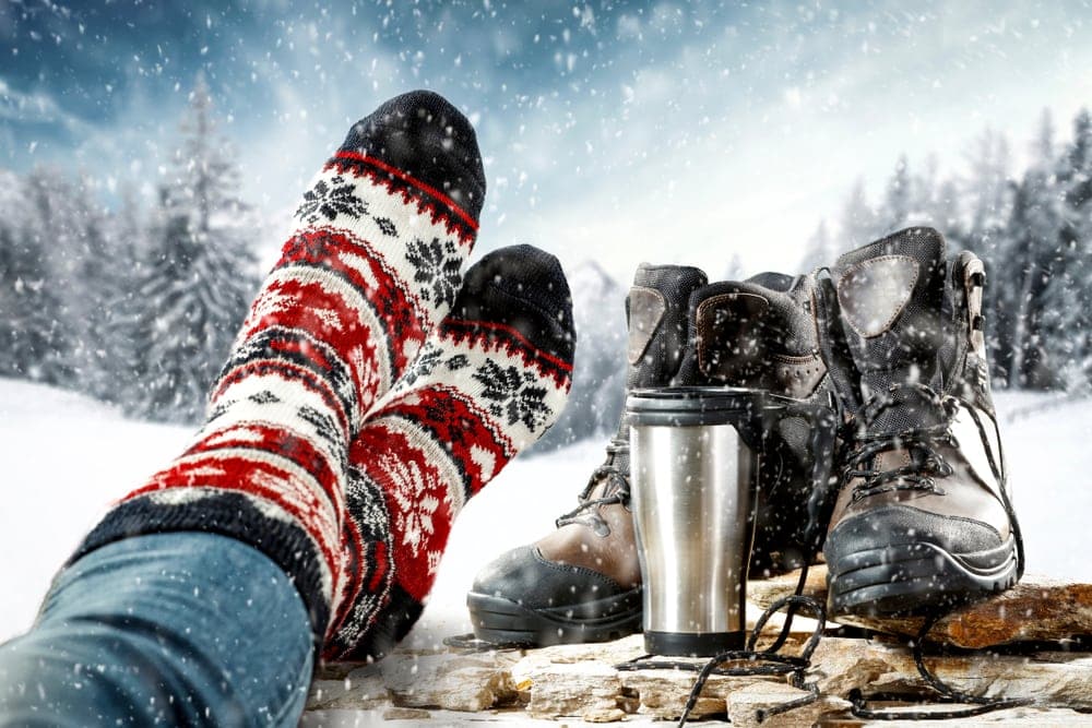 Christmas socks and hiking boots during winter