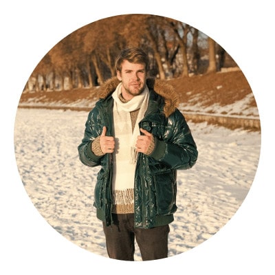 Guys modeling his layer of hiking jacket on winter