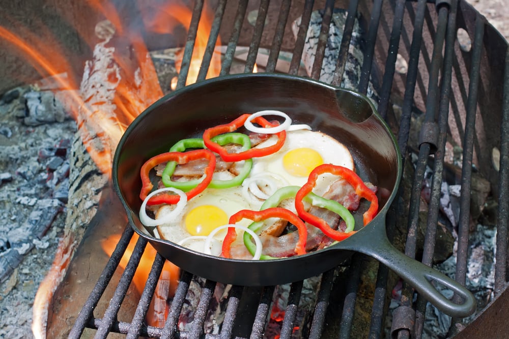 Cooking egg on a grilling barbeque