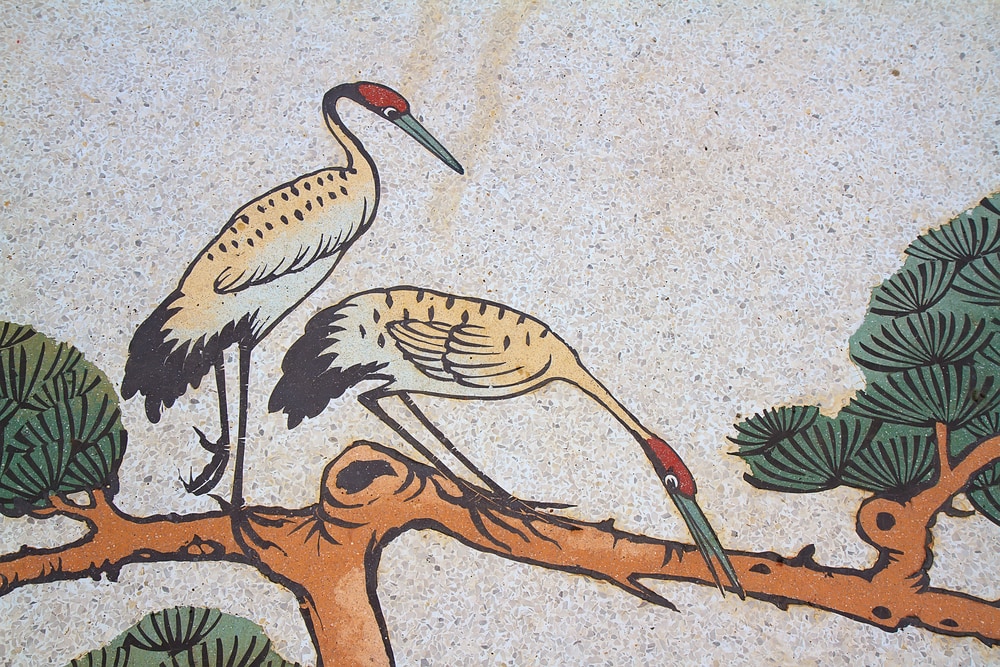 Painting of a flamingo in an old paper