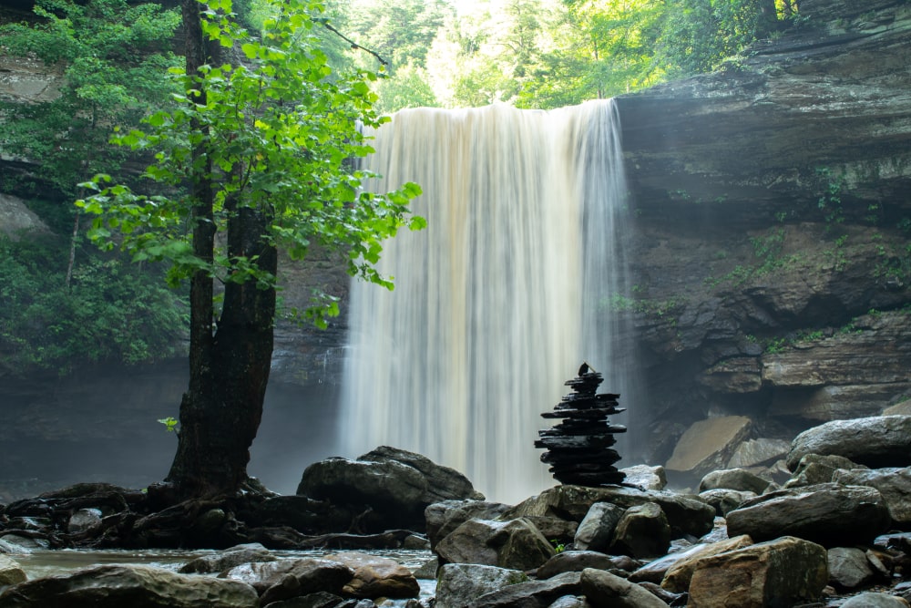 Water pours down Greeter Falls in Altamont, Tennessee.