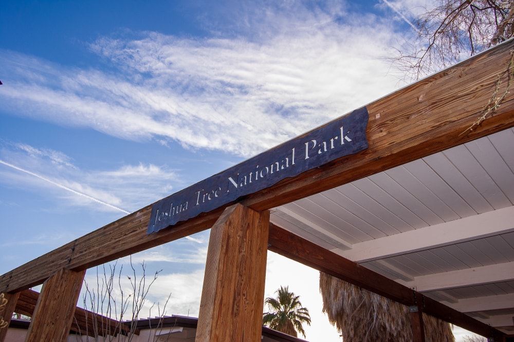 Joshua Tree National Park visitor center sign with sky behind