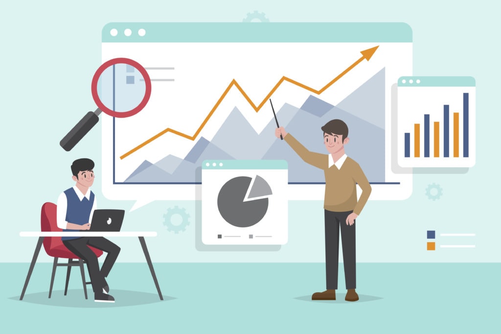 image of two people analyzing statistcs