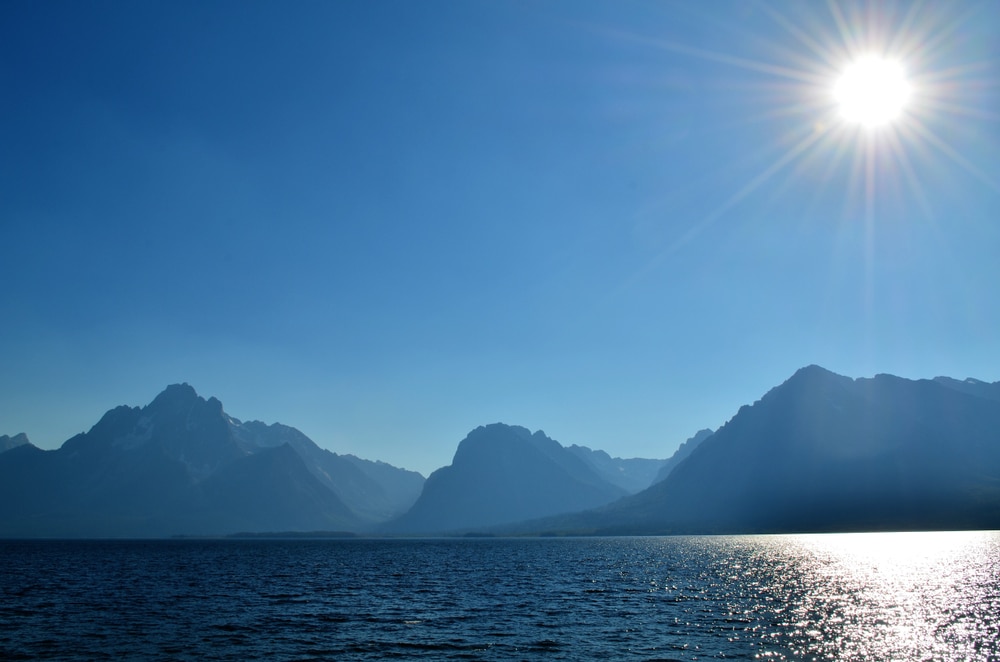 Yellowstone Lake of Wyoming with the silhouette of mountain