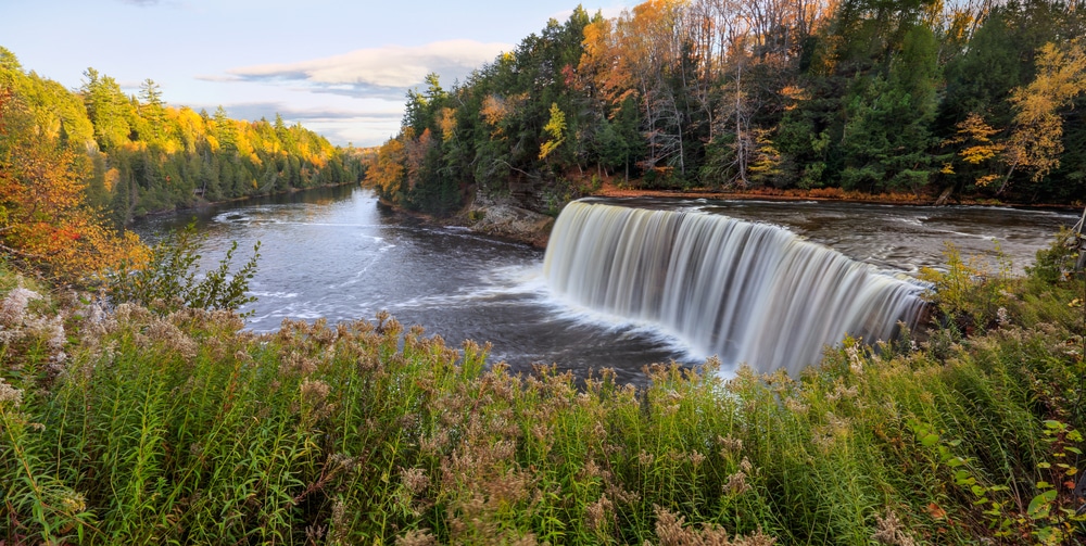A panoramic view of the Tahquamenon Falls and Tahquamenon River during Autumn, Upper Peninsula, Michigan, USA