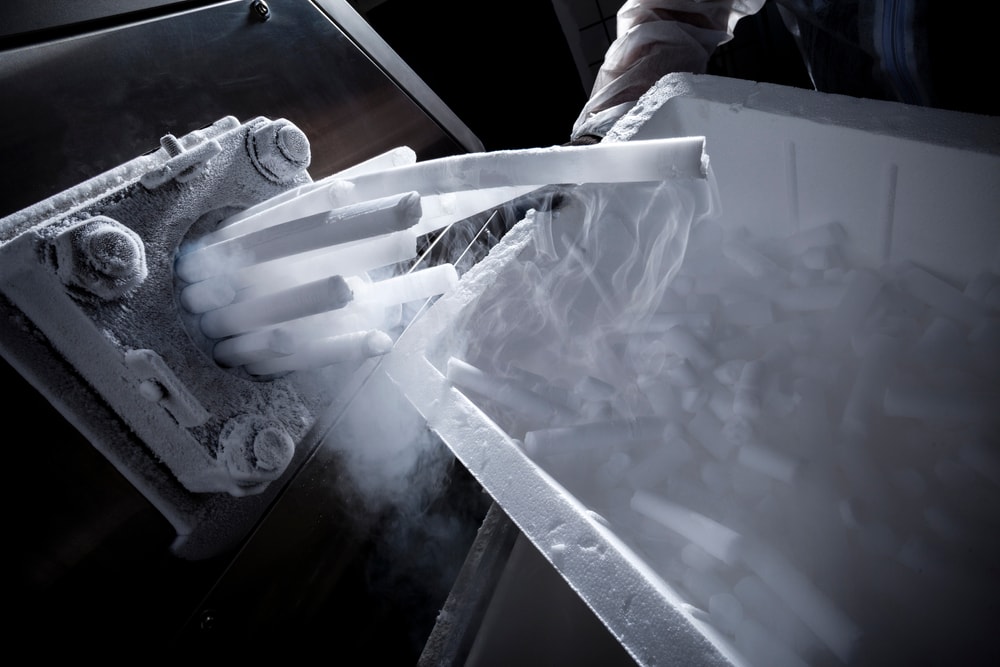 Dry ice being put in a cooler