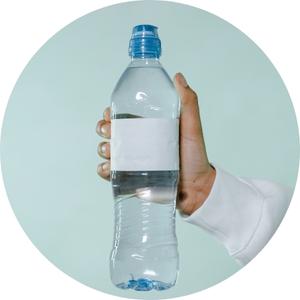 hand holding  a bottleed water