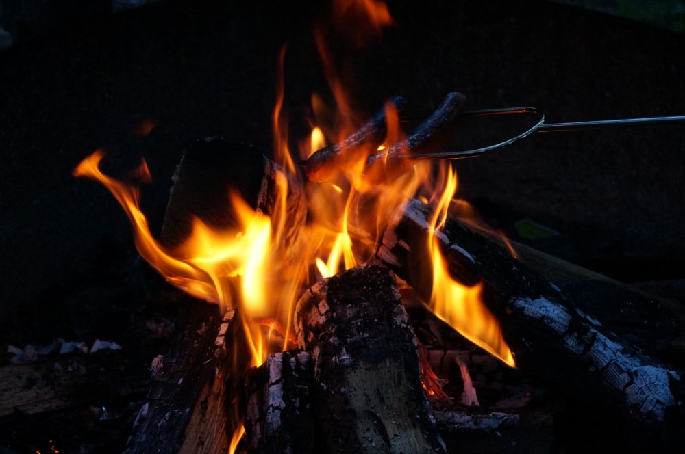 Wood set on fire at night