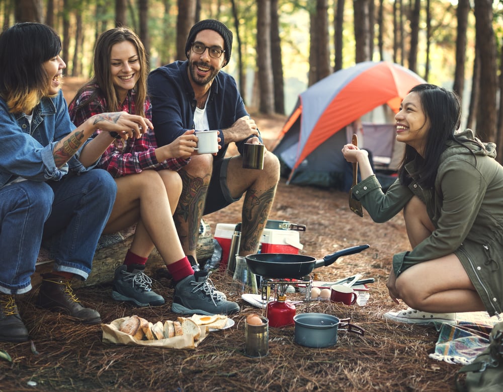 Friend happy eating their food in camping