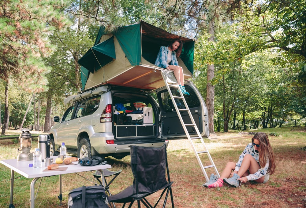 two women enjoying car camping
