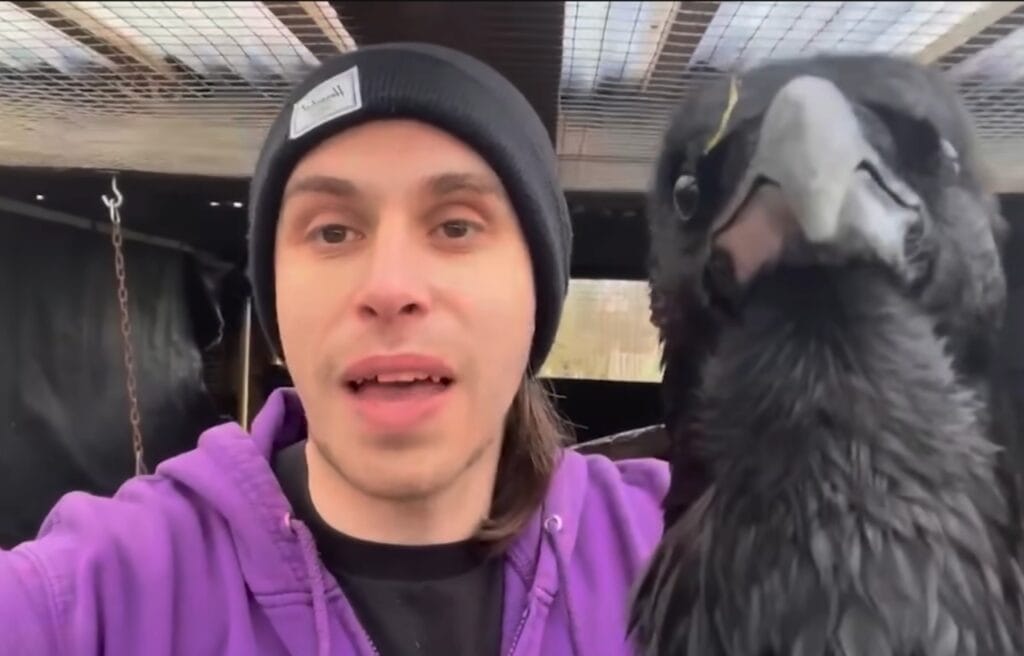 Elliot and Loki facing the camera