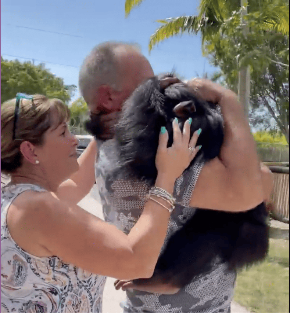 Tania and George hugging Limbani